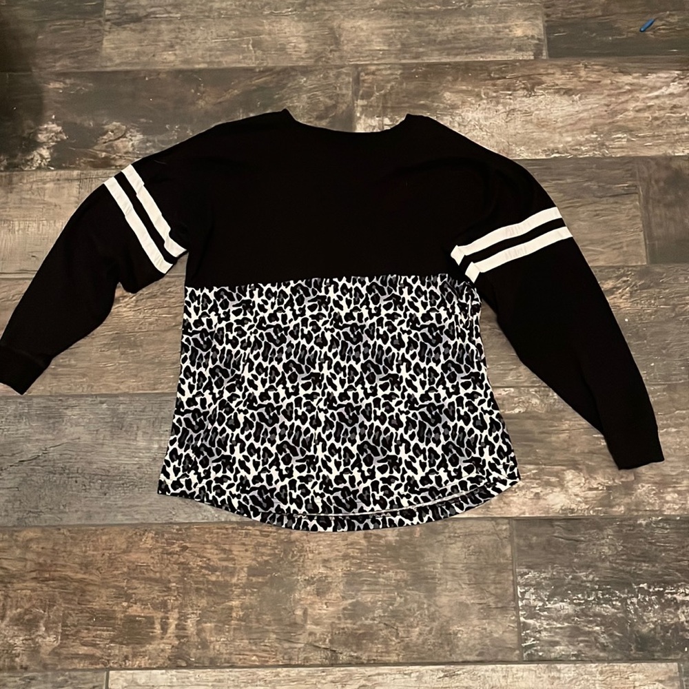 Long sleeve “Gymnastics” on back.